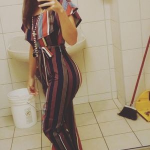 Off the shoulder jumpsuit with belt.